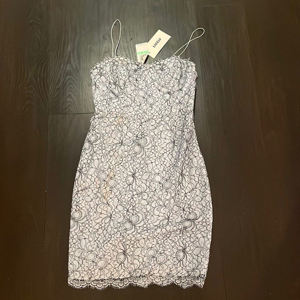 Likely baby blue & black lace fitted dress in size 8
